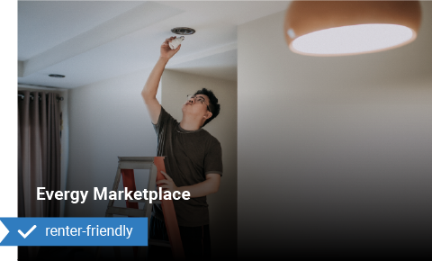 a man changing a lightbulb